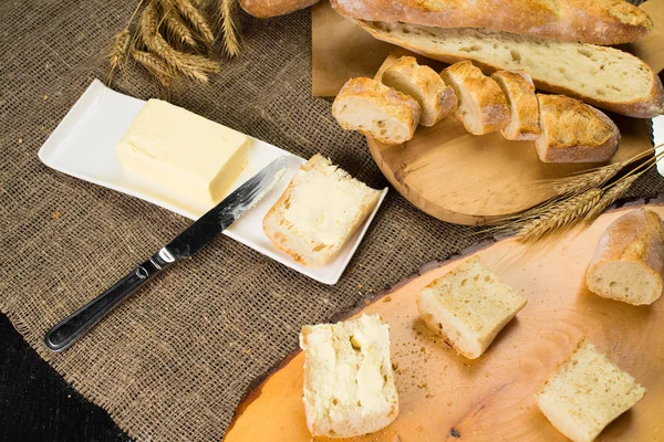 Still life with French fresh bread baguettes with poolish on a w — Stock Photo, Image