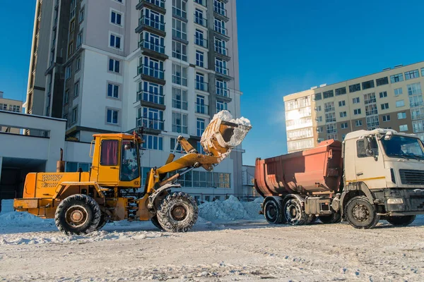 cleaning and snow loading on the truck