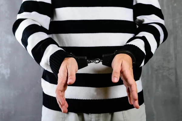 Front view of unidentified prisoner in prison stripped uniform s — Stock Photo, Image