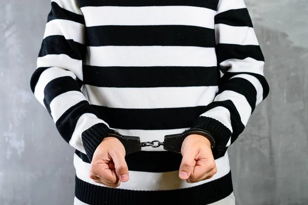 Front view of unidentified prisoner in prison stripped uniform s — Stock Photo, Image