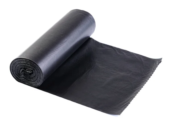 Black plastic polyethylene garbage bag roll isolated on white ba — Stock Photo, Image
