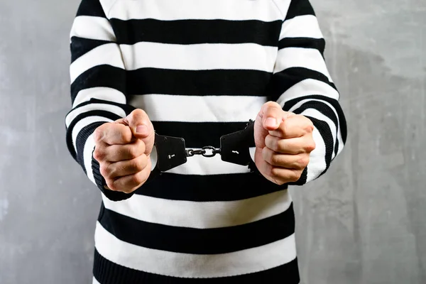 Front view of unidentified prisoner in prison stripped uniform s — Stock Photo, Image