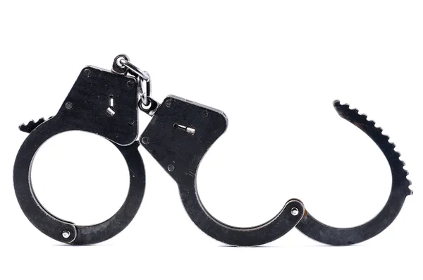 Disclosed black metal handcuffs isolated on white — Stock Photo, Image