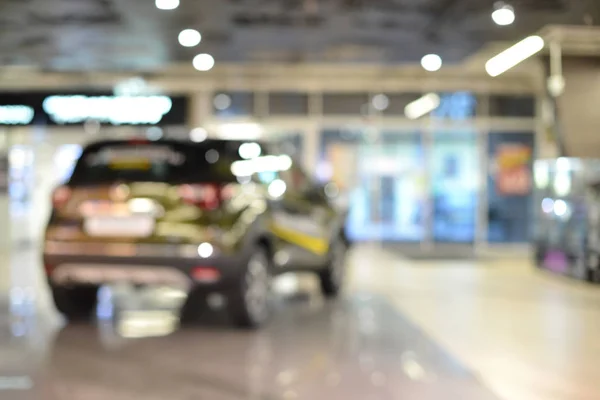 Verwischen den Hintergrund des Autos an einem Supermarkt, flache Tiefe o — Stockfoto