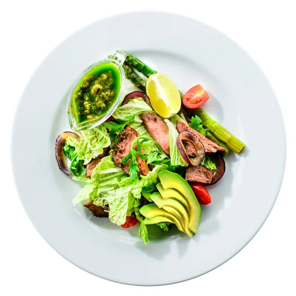 Finom zöld hús szaftos sült steak, avokádó saláta és — Stock Fotó