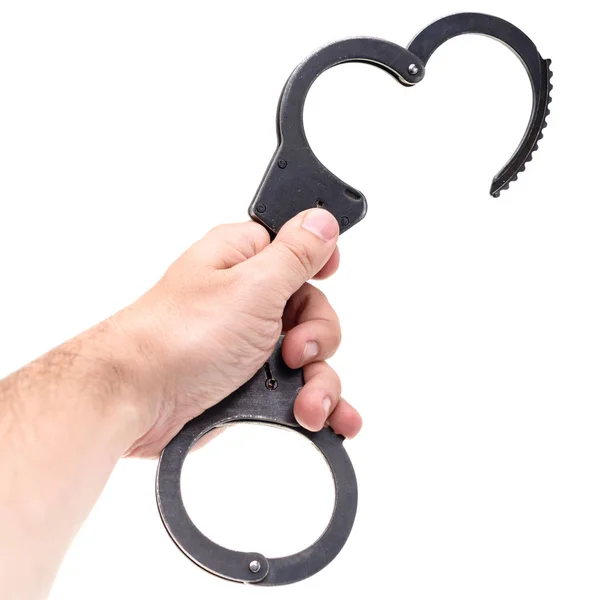 Close-up of man hand holding disclosed handcuffs, isolated on wh — Stock Photo, Image
