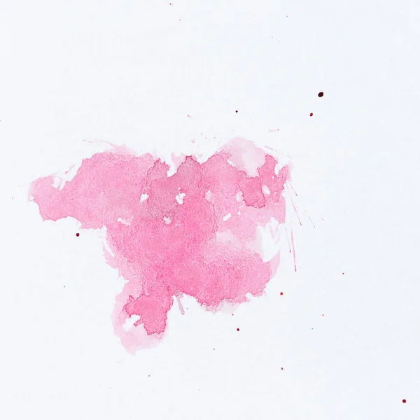 Pink paint splatter. Paint splash on white background. Watercolo