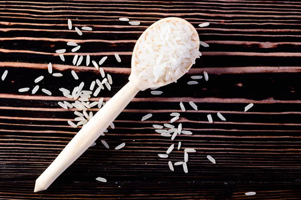 Raw Uncooked White Rice Wooden Spoon Wood Background Healthy Eating — Stock Photo, Image