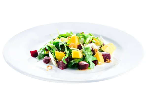 Delicious and appetizing salad with beetroot and fruit mango in — Stock Photo, Image