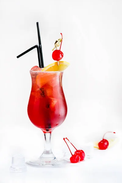 Front view of cold fresh tropical red cocktail in a tulip glass — Stock Photo, Image