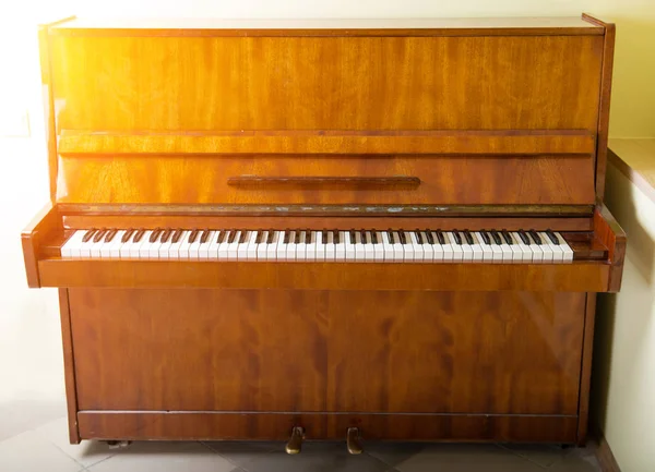 Classical piano with an open lid with Ray of sun