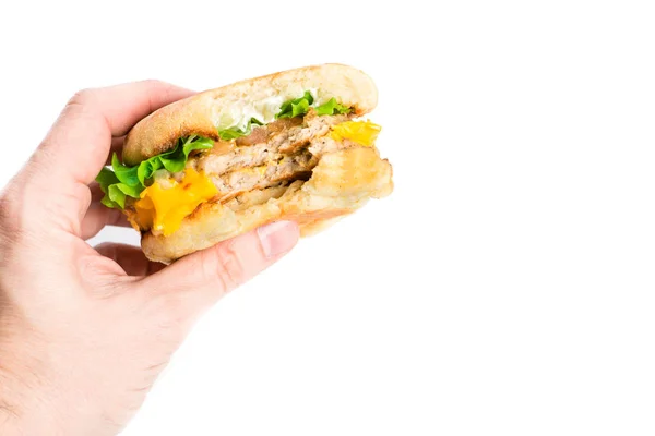 Hand met cheeseburger — Stockfoto