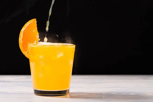 Glass of orange lemonade — Stock Photo, Image