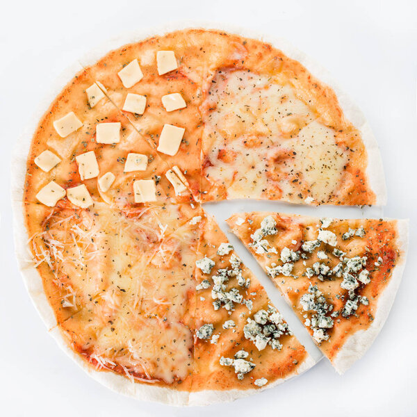 Sliced pizza with different kinds of cheese on a plate