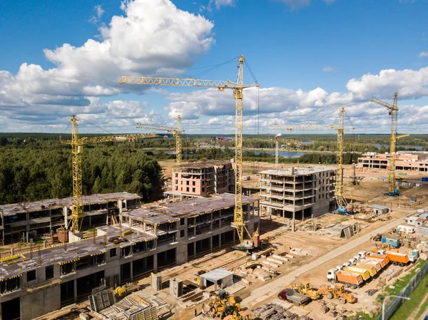 Construction site with crane and building. Aerial drone view — Stock Photo, Image