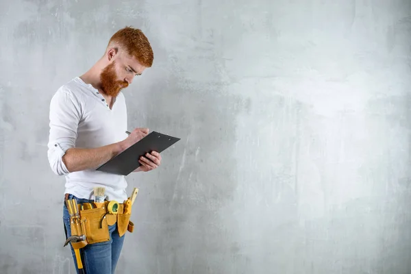 Bearded Brutal Architect Engineer Writing Digital Tablet Copy Spase Concrete — Stock Photo, Image