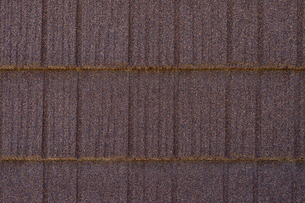 композитная плитка крупным планом, текстура кровли, вид сверху крупным планом с местом для копирования текста
