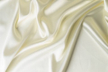 renkli saten kumaş beyaz bir parça yakın çekim dalgalar ve perdelik ile Deluxe ipek bez arka plan