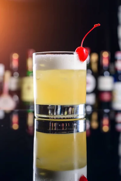 Cocktail whiskey sour, classic cocktail with bourbon and egg