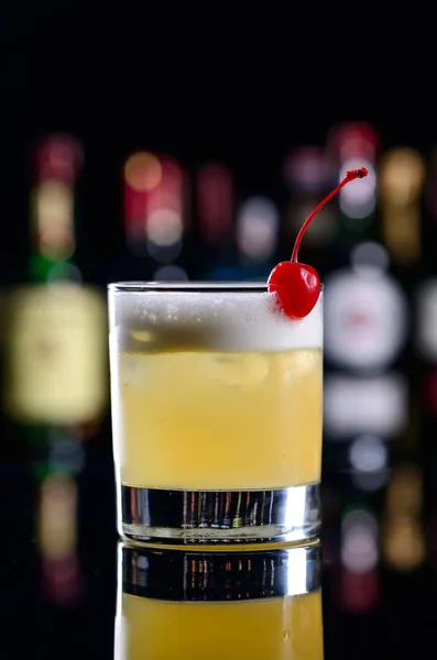 Cocktail whiskey sour, classic cocktail with bourbon and egg