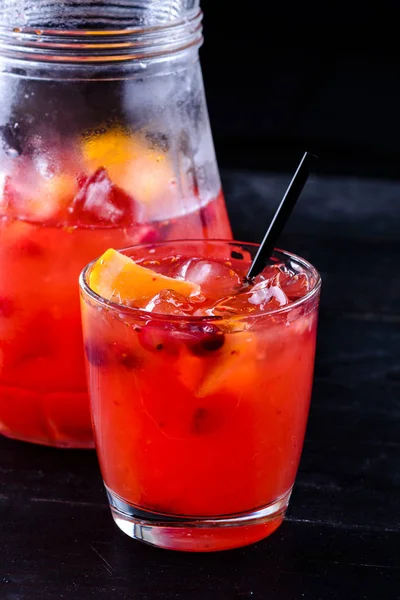 Fresh strawberry lemonade in glass jug, copy space — Stock Photo, Image