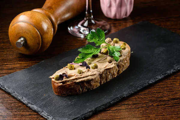 Sandwich with pate and capers — Stock Photo, Image