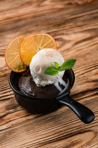 chocolate fondue with ice cream and orange