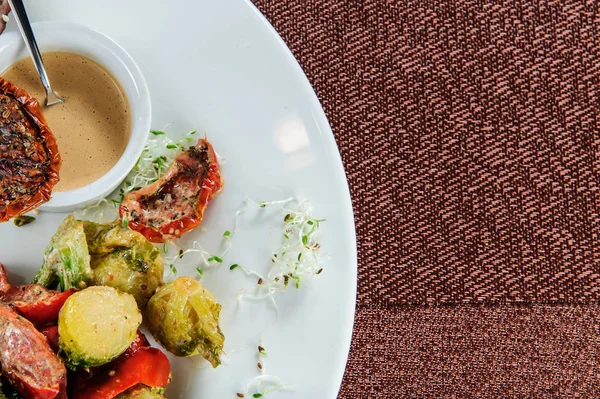 Roasted Cod Fillets Rolls Served Millet Steamed Broccoli Carrot Brussels — Stock Photo, Image