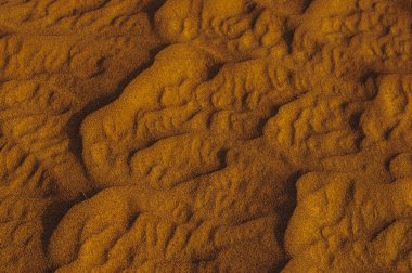 Çölde kumulların yapısı, Dubai, Birleşik Arap Emirlikleri.Close up. Areal görünümü.