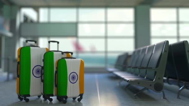 Travel suitcases featuring flag of India. Indian tourism conceptual animation — Stock Video