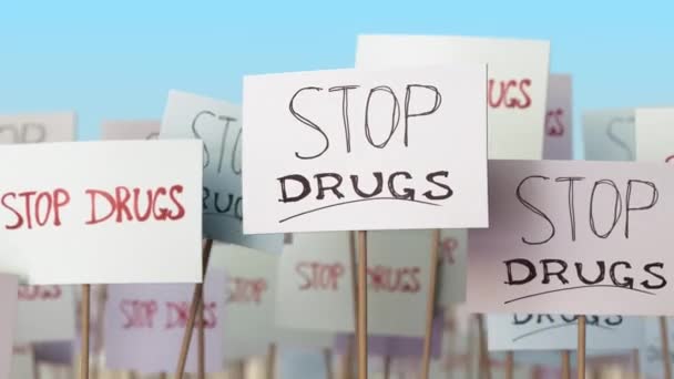STOP DRUGS placards at street demonstration. Conceptual loopable animation — Stock Video
