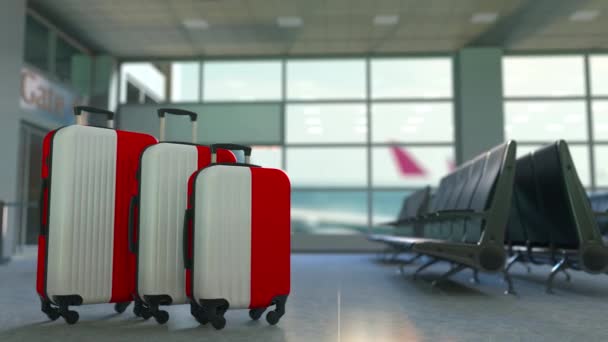 Путевые чемоданы с флагом Индонезии. Концептуальная анимация туризма в Индонезии — стоковое видео