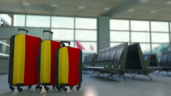 Travel suitcases featuring flag of Germany. German tourism conceptual 3D rendering — Stock Photo, Image