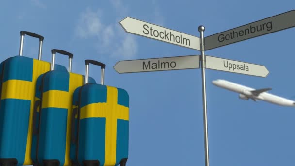 Travel baggage featuring flag of Sweden, airplane and city sign post. Swedish tourism conceptual animation — Stock Video