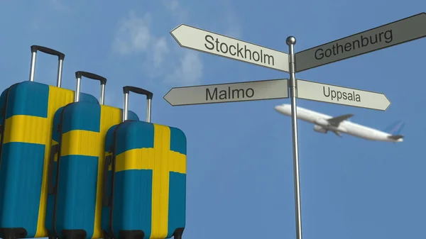 Cestovní zavazadla s vlajkou Švédska, letadla a město rozcestník. Švédština cestovní ruch koncepční 3d vykreslování — Stock fotografie