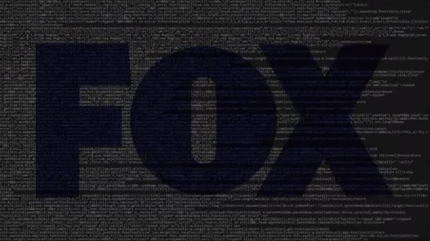 Logotipo de Fox Broadcasting Company hecho de código fuente en la pantalla del ordenador. Animación loopable editorial — Vídeo de stock