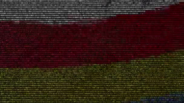 Flagge Südossetiens aus Textsymbolen auf einem Computerbildschirm schwenkend. konzeptionelle Schlupflöcher — Stockvideo