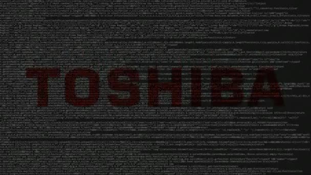 Toshiba Corporation λογότυπο κατασκευάζονται από πηγαίο κώδικα στην οθόνη του υπολογιστή. Editorial loopable κινούμενα σχέδια — Αρχείο Βίντεο