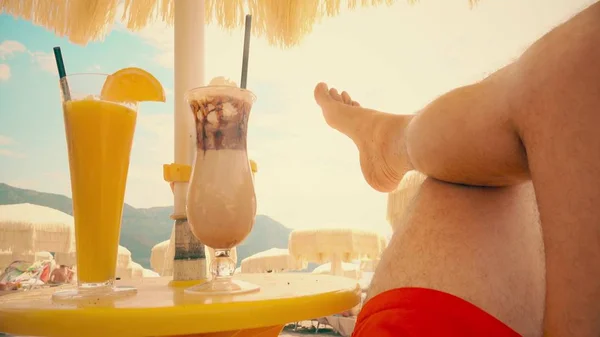 POV shot of a man relaxing on the beach — Stock Photo, Image