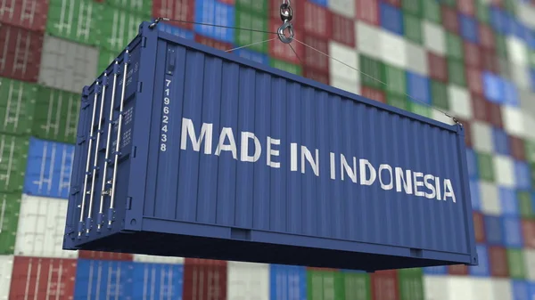 Loading container with MADE IN INDONESIA caption. Indonesian import or export related 3D rendering — Stock Photo, Image