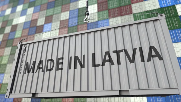 Recipiente de carga com legenda MADE IN LATVIA. Renderização 3D relacionada com a importação ou exportação na Letónia — Fotografia de Stock