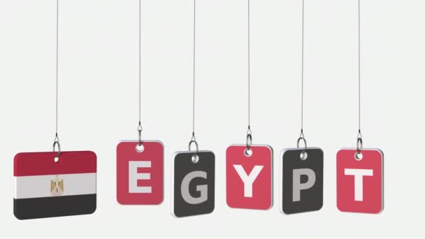 Подпись EGYPT и египетский флаг на раскачивающихся тарелках, зацикленная вступительная анимация. Альфа-мат для легкой замены фона — стоковое видео