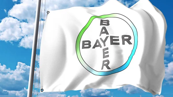 Bandiera sventolante con logo Bayer AG contro nuvole e cielo. Rendering editoriale 3D — Foto Stock