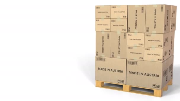 HECHO EN AUSTRIA texto en cajas de cartón de almacén. Animación 3D — Vídeo de stock