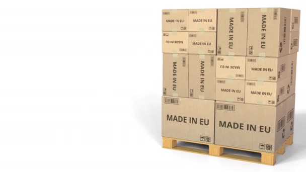 MADE IN EU text on warehouse cartons (en inglés). Animación 3D — Vídeos de Stock