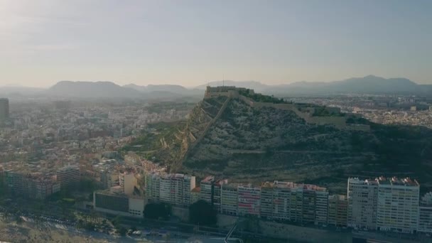 Aerial shot of Alicante cityscape and Santa Barbara castle, Spain — Stock Video