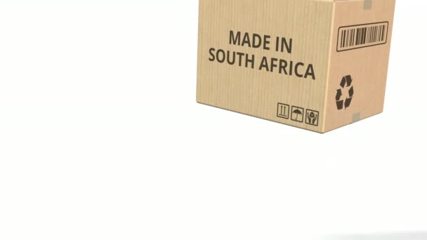 Caja de cartón con texto MADE IN SOUTH AFRICA, animación 3D — Vídeo de stock