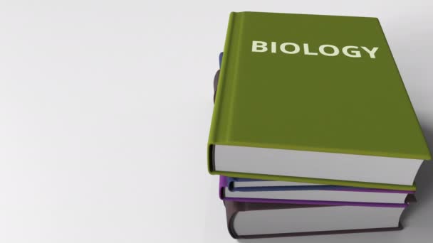 Boka med biologi titel. 3D-animering — Stockvideo