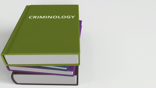 Boek met de titel van de criminologie. 3D animatie — Stockvideo