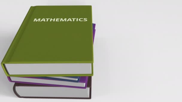 Pile of books on MATHEMATICS. 3D animation — Stock Video